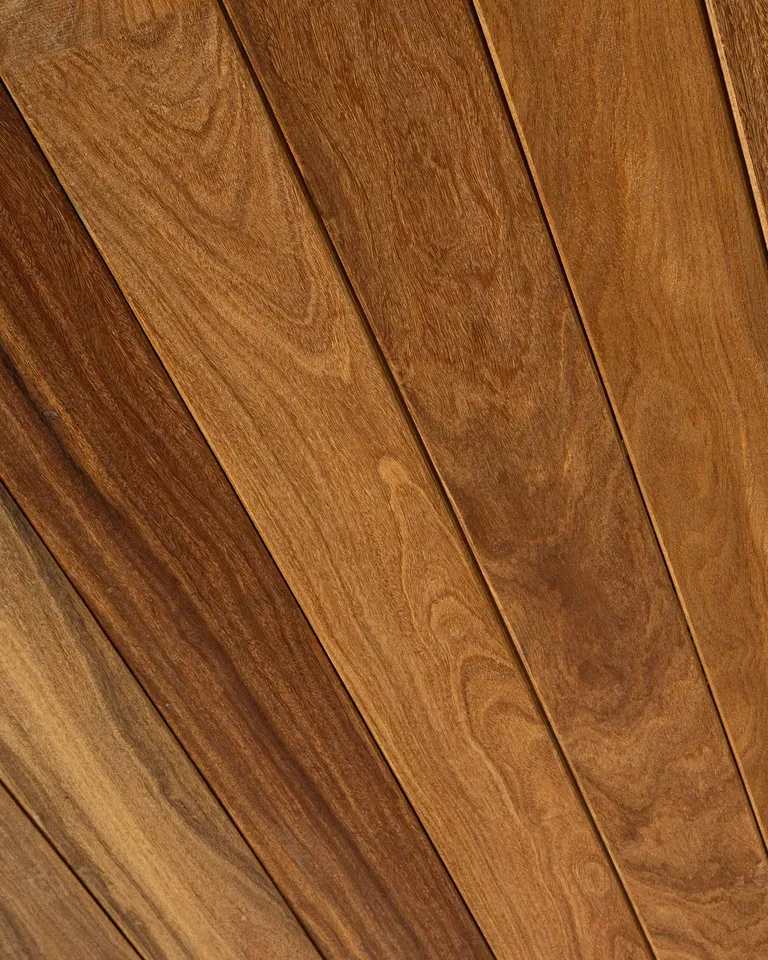 Close-up of natural wood ceiling boards showing grain and board joints