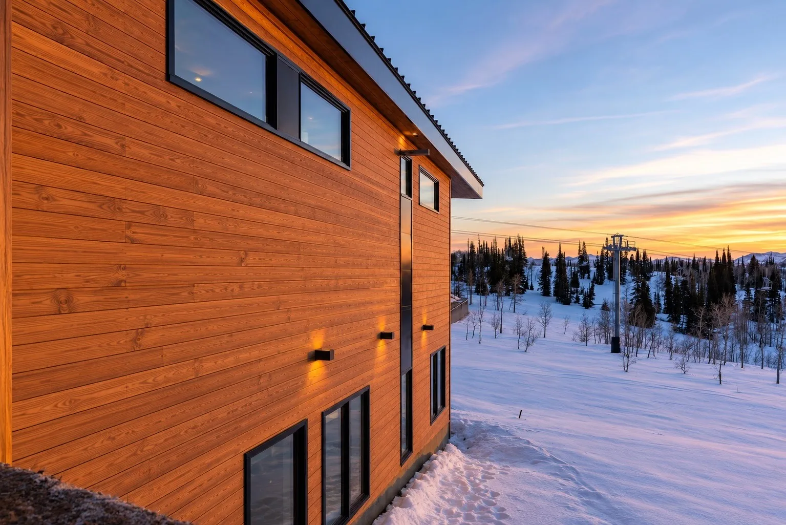 Radiata collection project with wood siding beside a snowy landscape