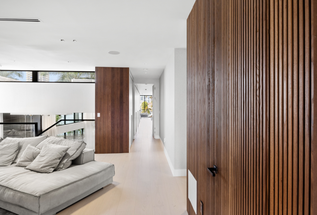 Living room space with thermally modified red oak accents